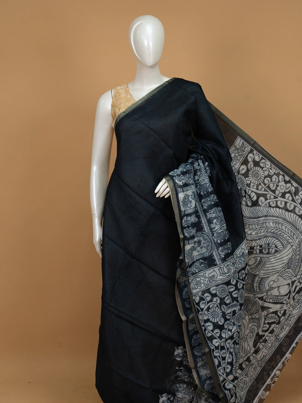 Black linen cotton saree with white Kalamkari-style peacock and floral printed pallu and a slim zari border