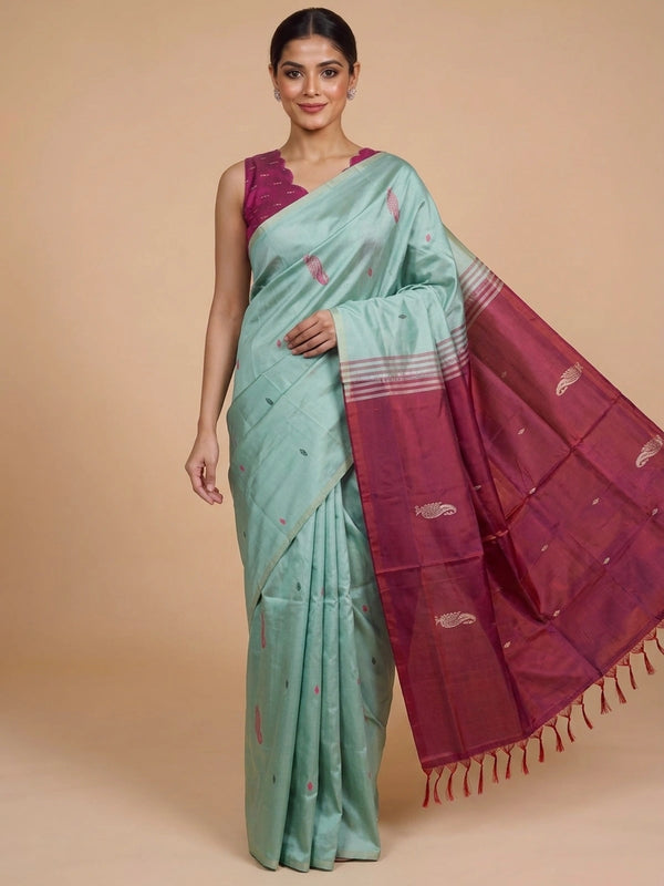 Sea green Banana Silk saree with contrast maroon pallu, paisley butta and silver zari motifs