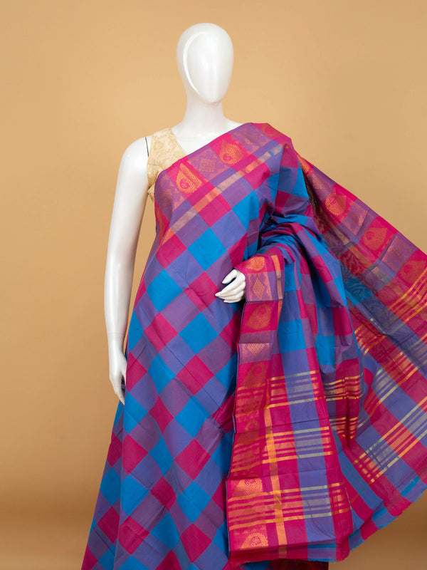Pink and blue checked Chettinad cotton saree with gold zari border and paisley motif pallu