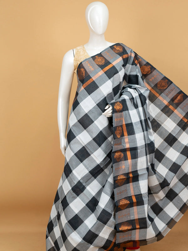 Grey and black checked Chettinad cotton saree with copper zari floral border