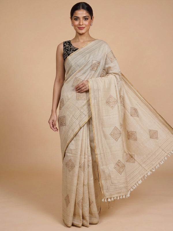 Cream linen cotton saree with gold zari border and embroidered diamond motifs