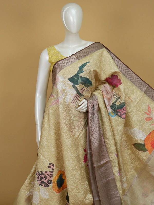 Cream and mauve floral designer tissue saree with woven jaal and contrast zari border