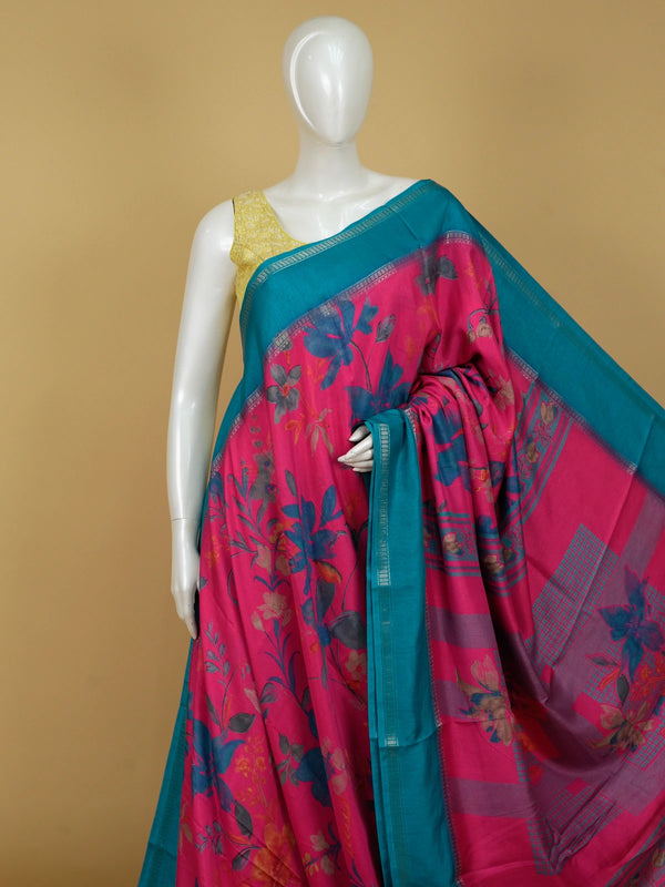 Pink Dola silk saree with multicolour floral print and contrast teal blue zari border