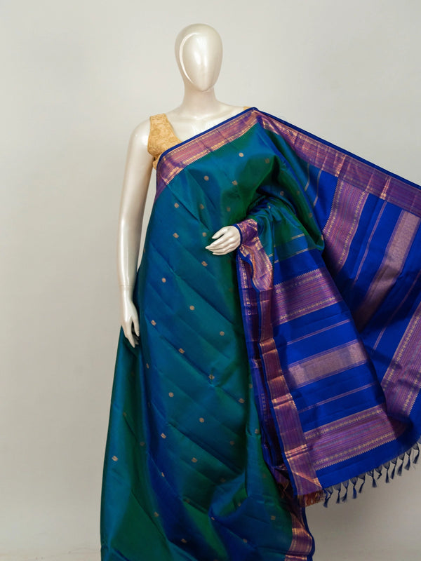 Peacock teal pure Kanchipuram silk saree with contrast royal blue gold zari border and woven pallu
