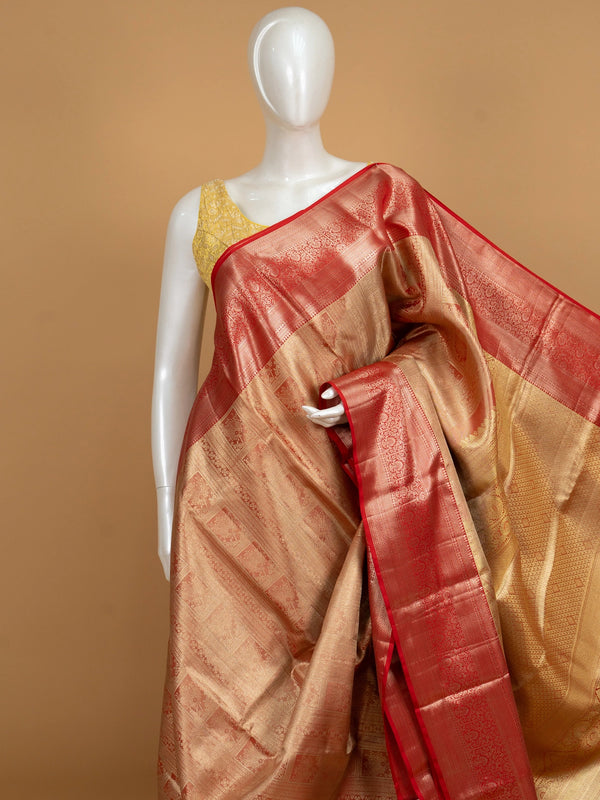 Gold and red pure Kanchipuram silk saree with gold zari brocade body and contrast red border