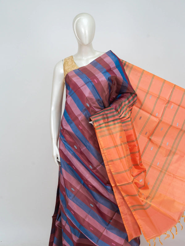 Multicolour checked banana silk saree with contrast orange striped pallu and buti motifs