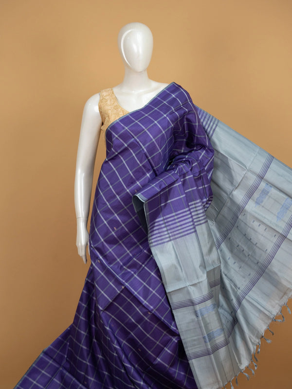 Violet banana silk saree with white and silver checks and contrast grey striped pallu