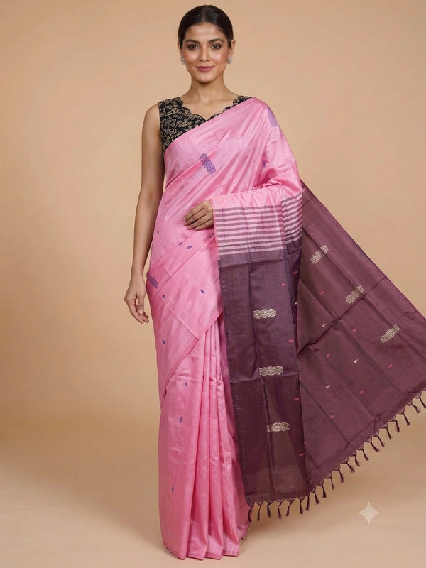 Pink banana silk saree with contrast maroon pallu, woven buti motifs, and black floral blouse