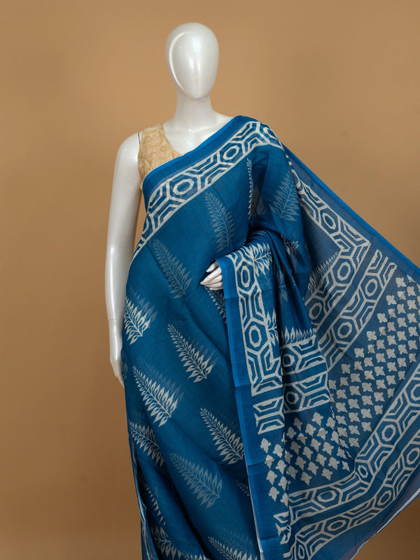 Peacock blue and white block printed linen cotton saree with geometric border and fern motifs