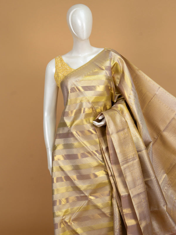 Gold and lilac pure Kanchipuram silk saree with diagonal zari stripes and floral zari border