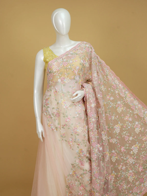 Soft pink net designer saree with pastel multicolour floral embroidery and scalloped border