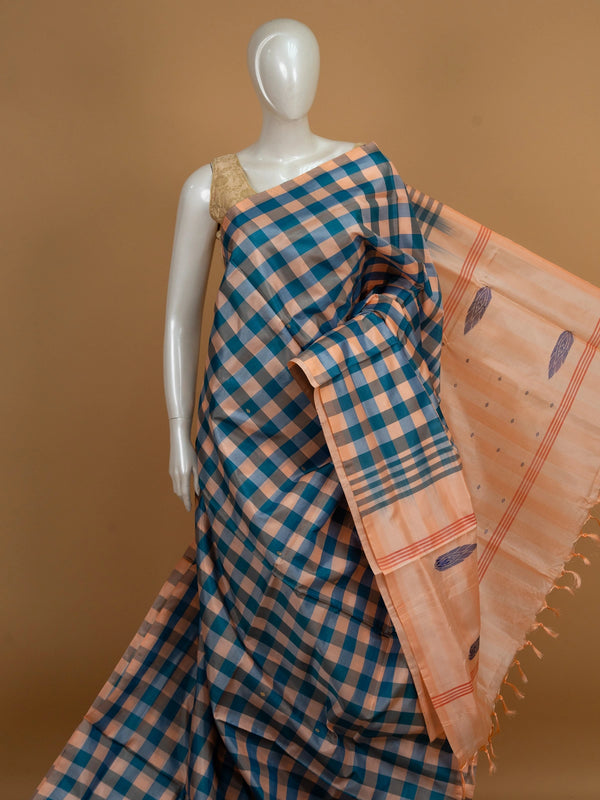 Teal blue and peach checked banana silk saree with contrast peach pallu and woven leaf motifs