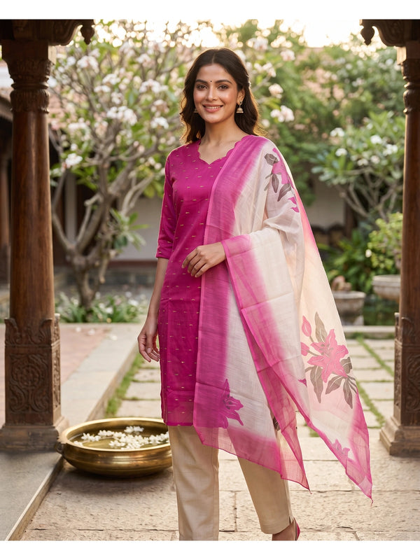 Rani pink art silk kurti set with gold butis, beige pants and cream floral print dupatta