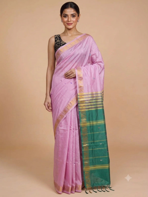 Pink and green Banana Silk saree with gold zari border, contrast pallu and black embroidered blouse