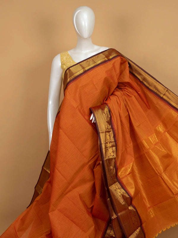 Orange Chettinad cotton saree with fine checks and contrast maroon gold zari border