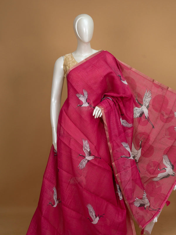 Rani pink linen cotton saree with white flying crane prints, tonal circles and a thin gold zari border
