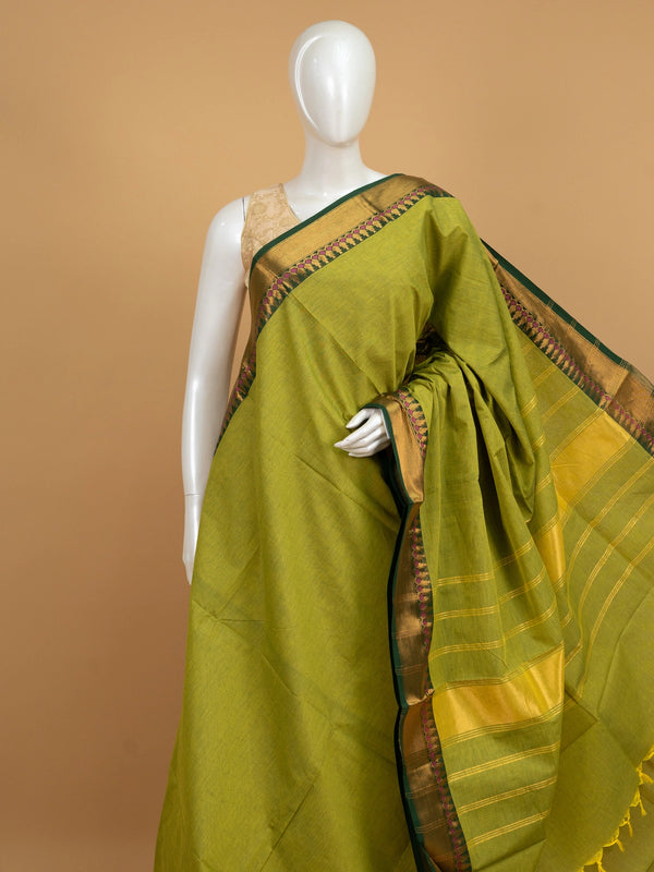 Mehndi green Chettinad cotton saree with contrast dark green gold zari border and striped pallu