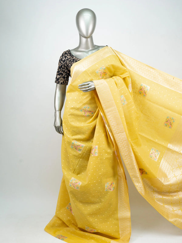 Bright yellow linen cotton saree with gold zari border, buti dots and pastel bird-floral motifs