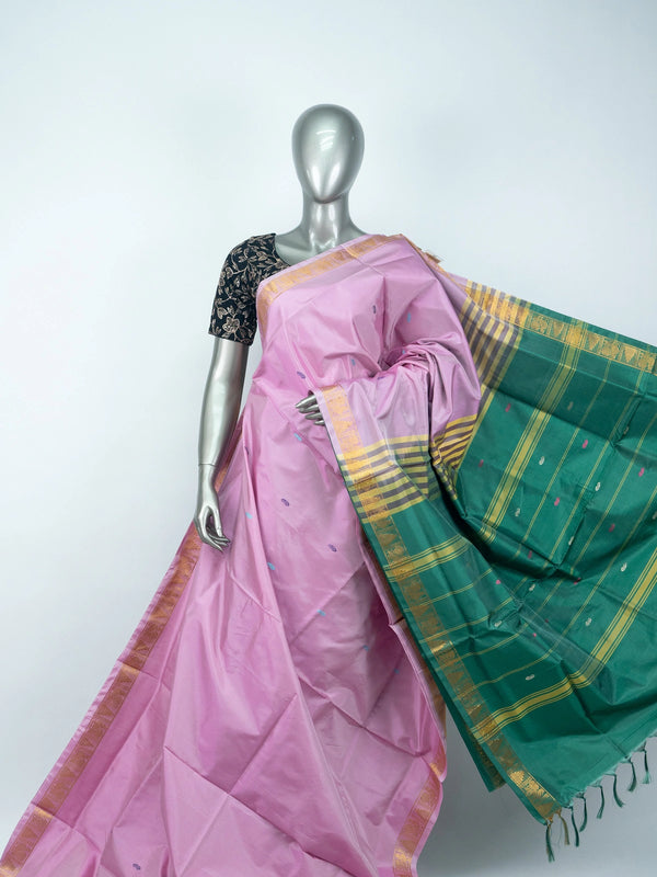 Pink and green Banana Silk saree with gold zari border, contrast pallu and black embroidered blouse