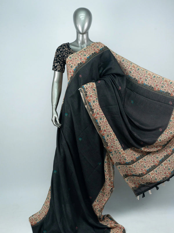 Black linen cotton saree with contrast cream multicolour floral border and pallu