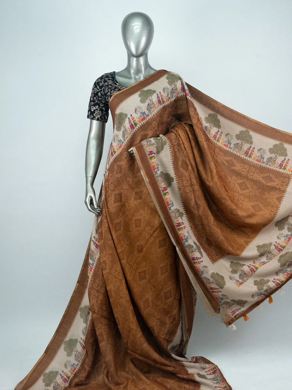 Brown and cream linen cotton saree with pichwai-style printed border, ikat body and contrast black blouse