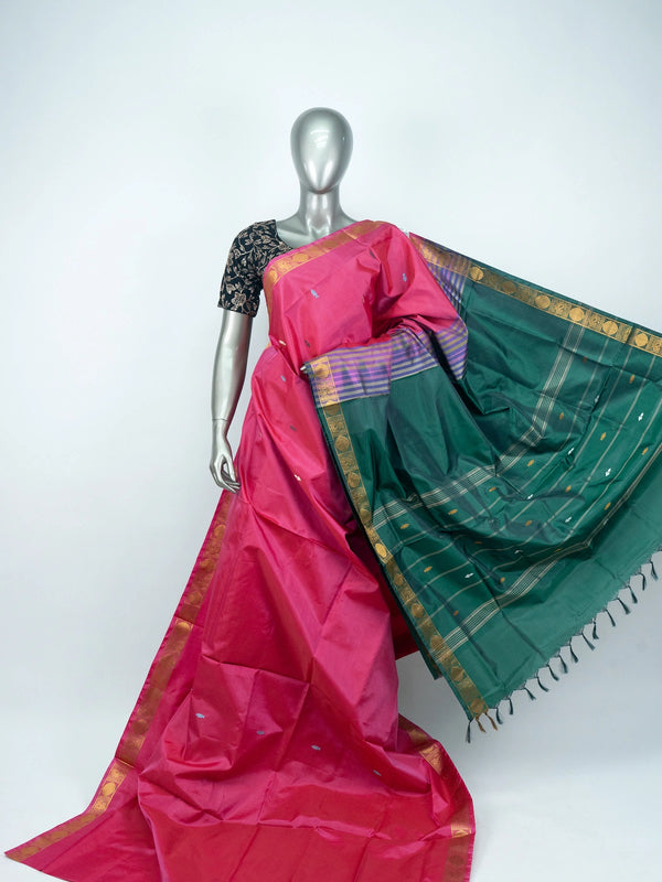 Pink Banana Silk saree with contrast green pallu and gold zari border