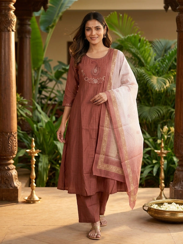 Rust cotton Anarkali kurti set with paisley embroidered yoke, straight pants, and printed cream dupatta