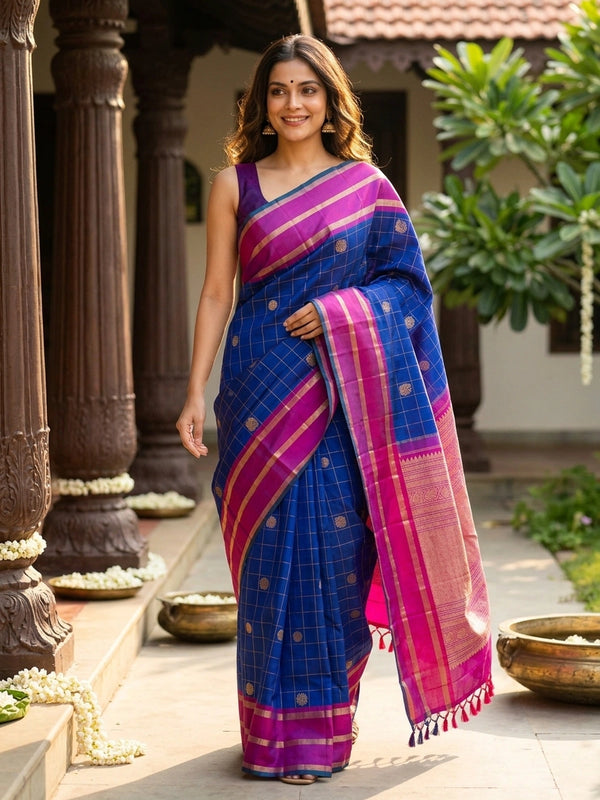 Royal blue pure Kanchipuram silk saree with gold zari checks and a contrast magenta zari border