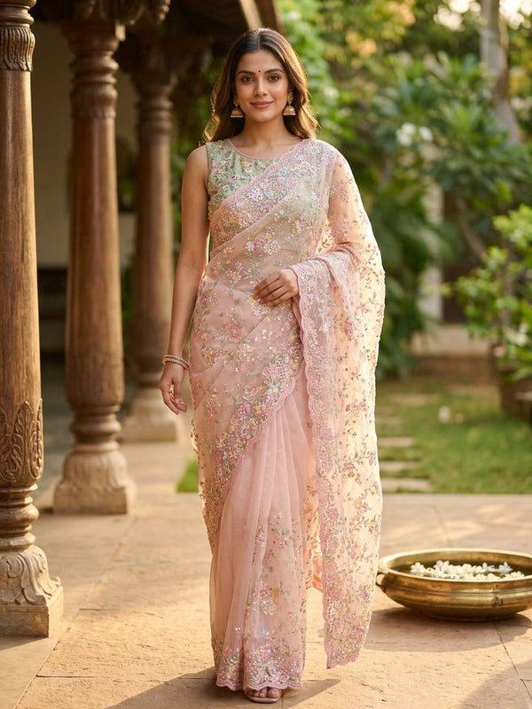 Soft pink net designer saree with pastel multicolour floral embroidery and scalloped border