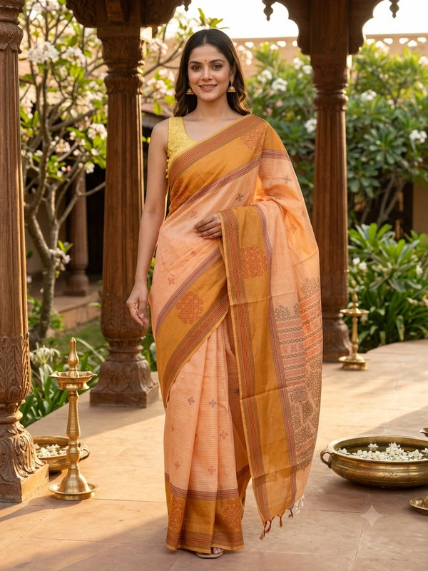 Peach and mustard semi raw silk saree with contrast border and kolam motif pallu