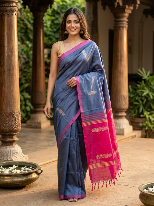 Grey-blue Banana Silk saree with contrast pink zari border and pallu