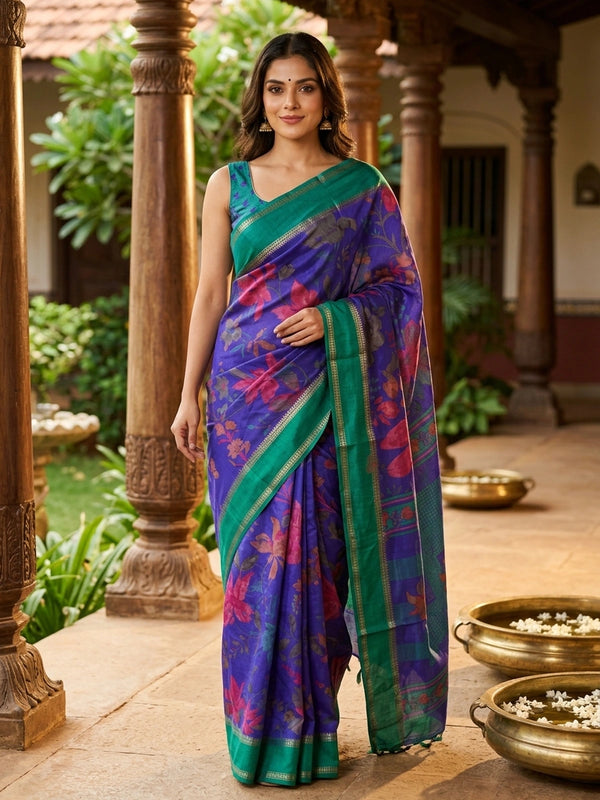 Violet blue Dola silk saree with floral print body and contrast teal green gold zari border