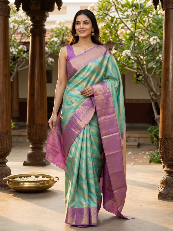 Turquoise green pure Kanchipuram silk saree with diagonal gold zari stripes and contrast lavender zari border