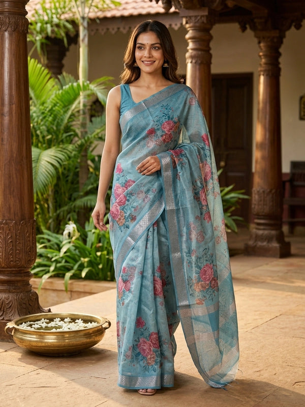 Sky blue semi tussar saree with pink rose floral print and silver zari border