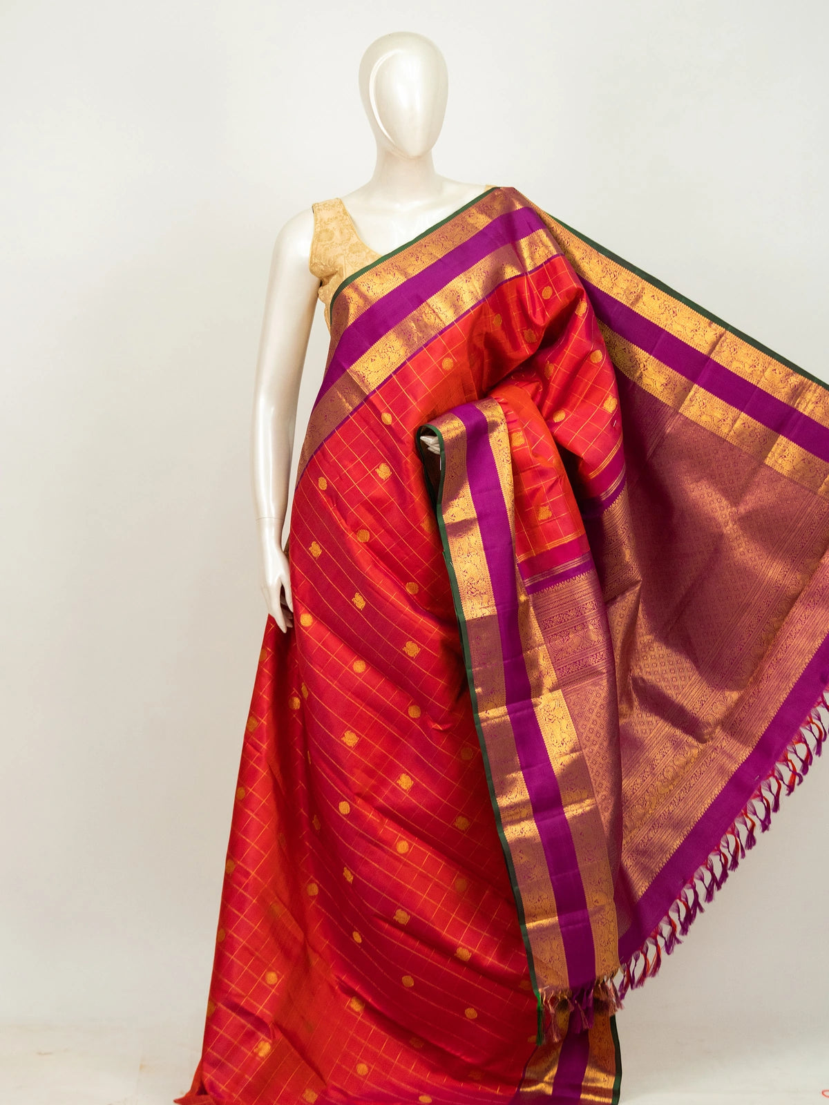 Orange pure Kanchipuram silk saree with magenta contrast gold zari border and brocade pallu