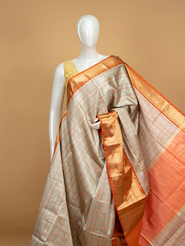 Grey and orange Kanchi semi silk saree with checked body and gold zari contrast border