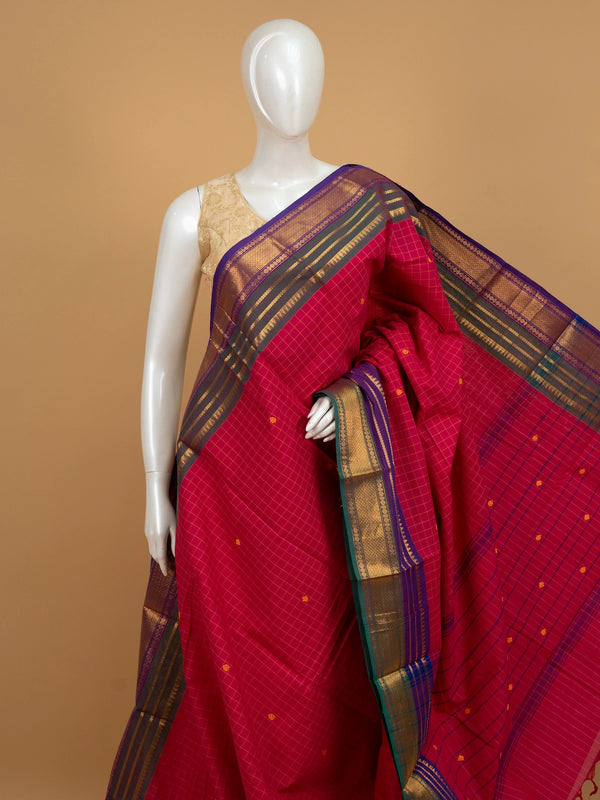 Pink Chettinad cotton saree with checked body, woven buttas, and contrast purple gold zari border