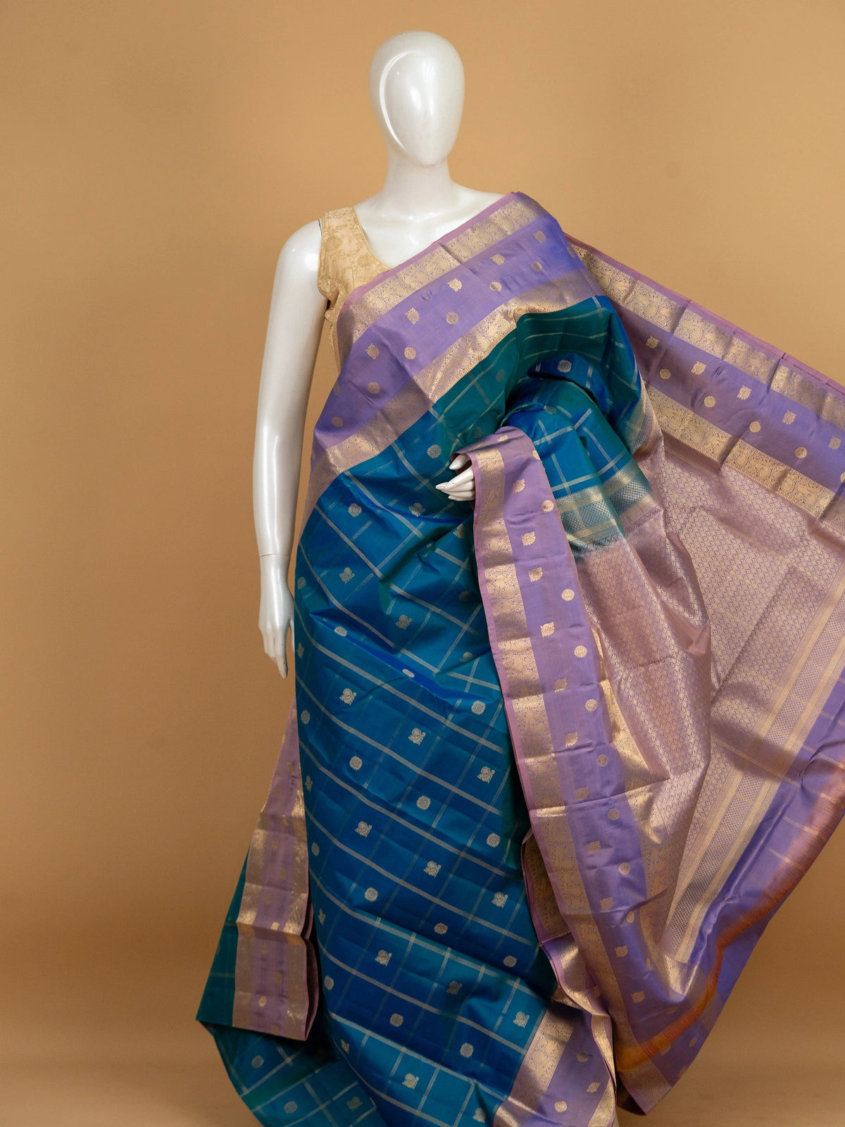 Peacock blue pure Kanchipuram silk saree with gold zari checks and contrast lavender zari border