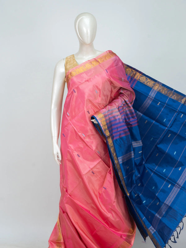 Pink Banana silk saree with contrast blue pallu, gold zari border and woven buttis