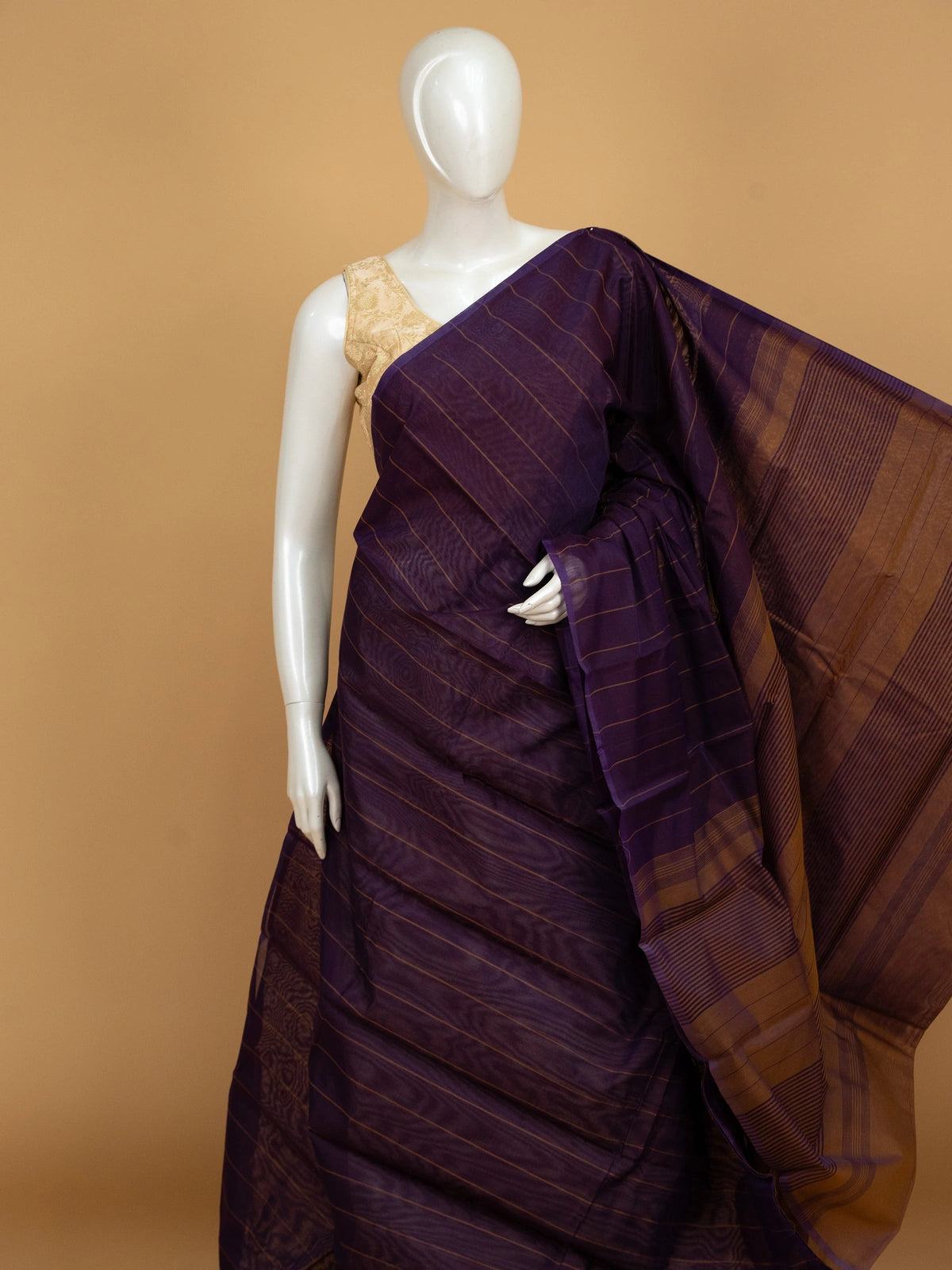 Purple silk cotton saree with gold stripes and mustard striped pallu