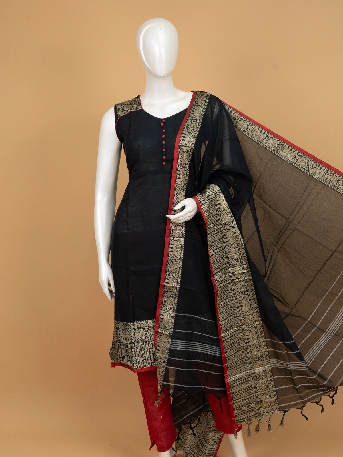 Black cotton silk straight cut kurti set with gold zari border, red contrast pants and dupatta