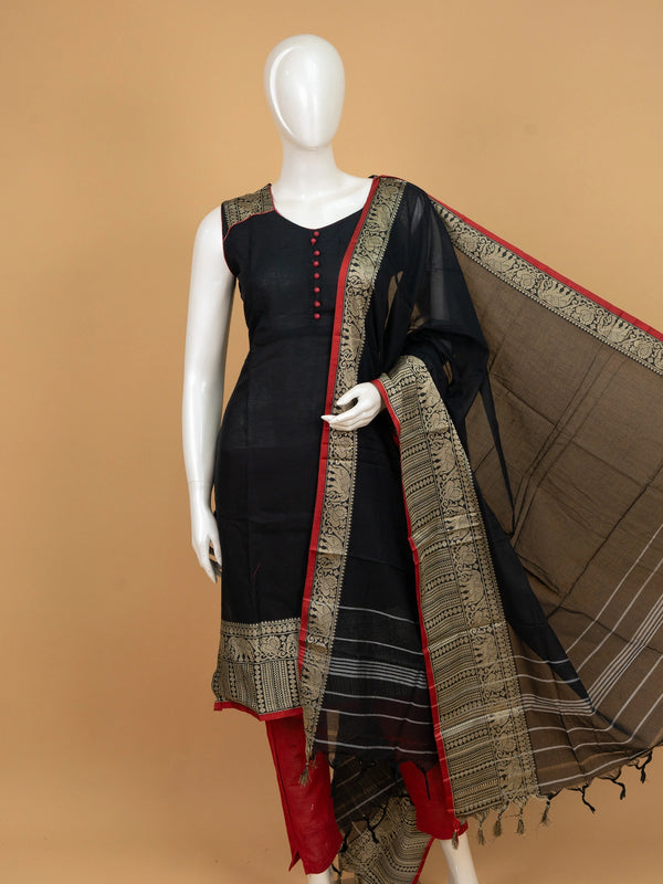 Black cotton silk straight cut kurti set with gold zari border, red contrast pants and dupatta