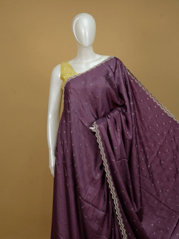 Wine purple designer saree with scattered stone buttas and scalloped silver stone border