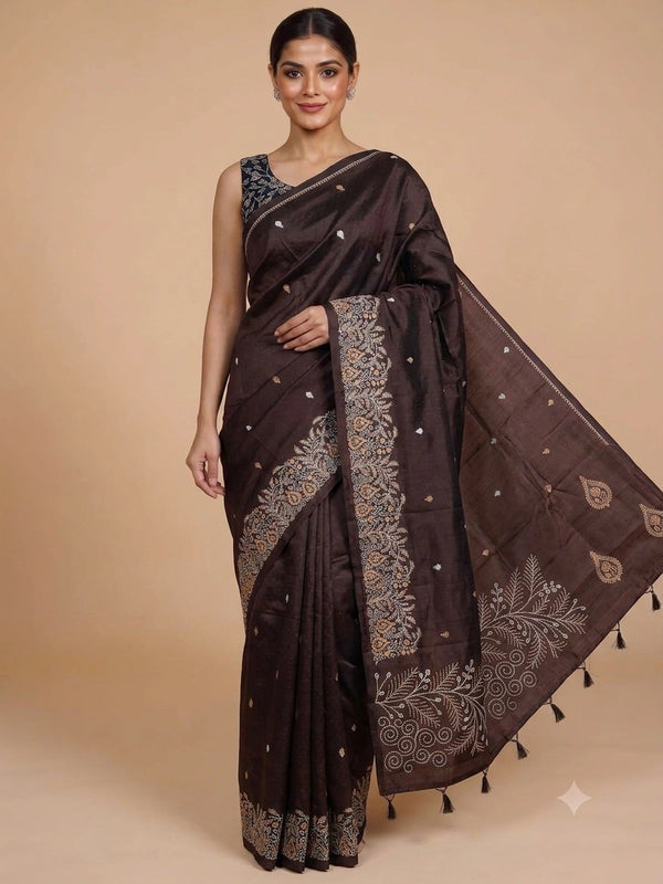 Dark chocolate brown semi raw silk saree with embroidered floral pallu and contrast black blouse