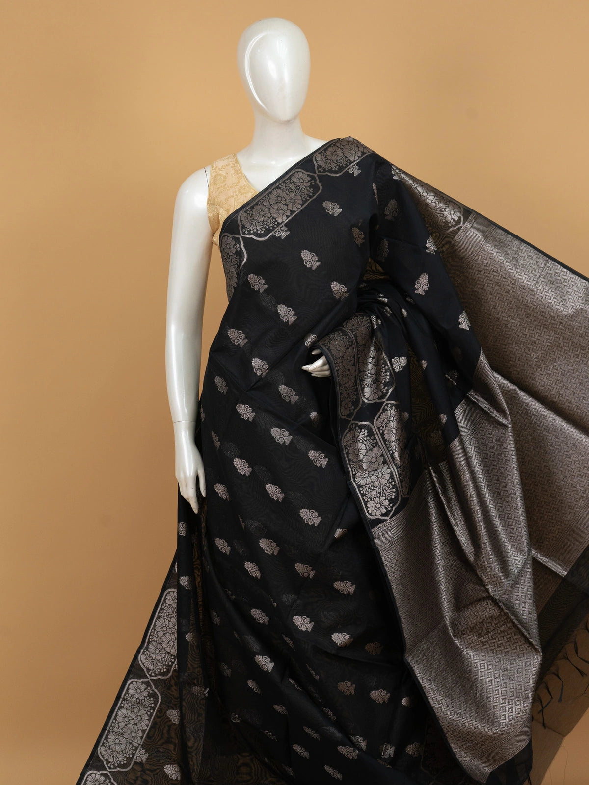 Black silk cotton saree with silver zari floral buttas and diamond-woven contrast pallu and border