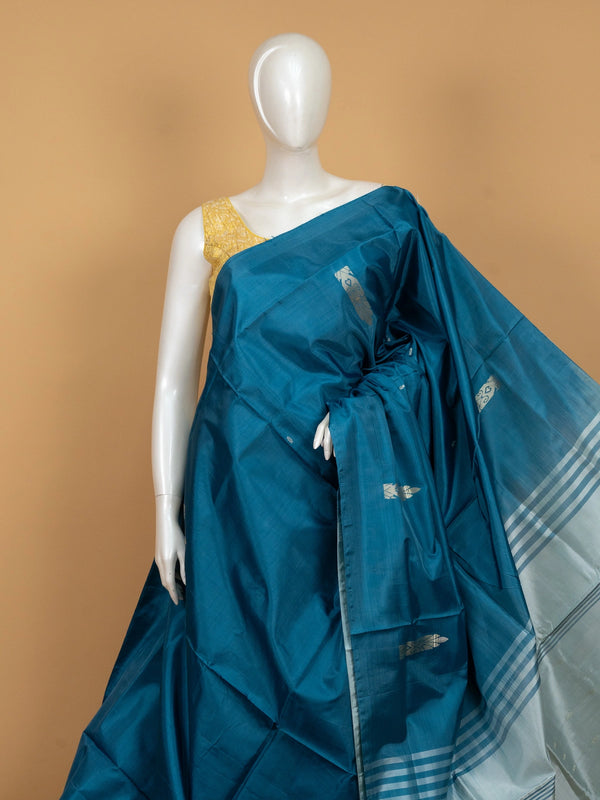 Peacock teal blue Banana Silk saree with silver zari buttas and contrast silver-grey pallu
