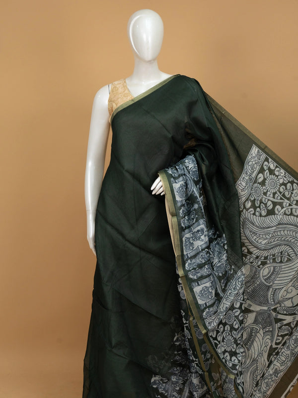 Dark green linen cotton saree with off-white Kalamkari peacock and floral printed pallu and gold zari border