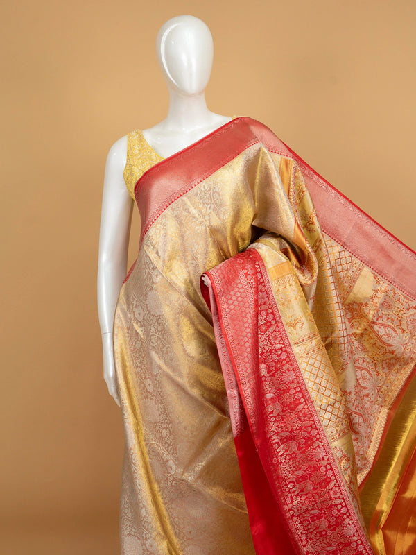 Cream-gold pure Kanchipuram silk saree with contrast red zari border and elephant motifs