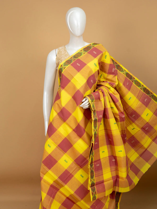Yellow and red Chettinad cotton saree with checks, paisley buttas and contrast geometric border