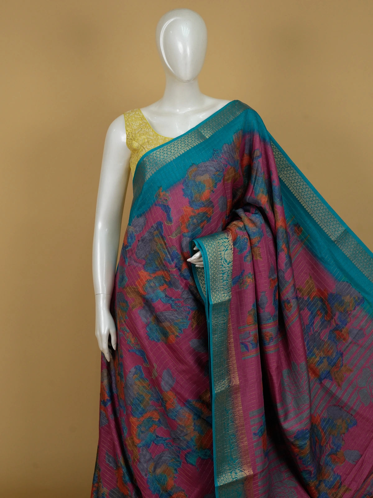 Magenta Dola silk saree with multicolour floral print and contrast teal gold zari border